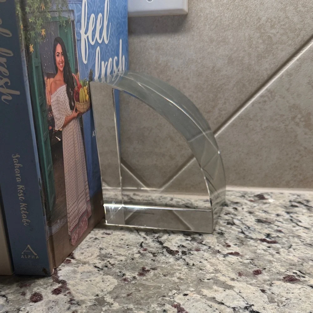 CB2 Silver Curved Acrylic Bookend